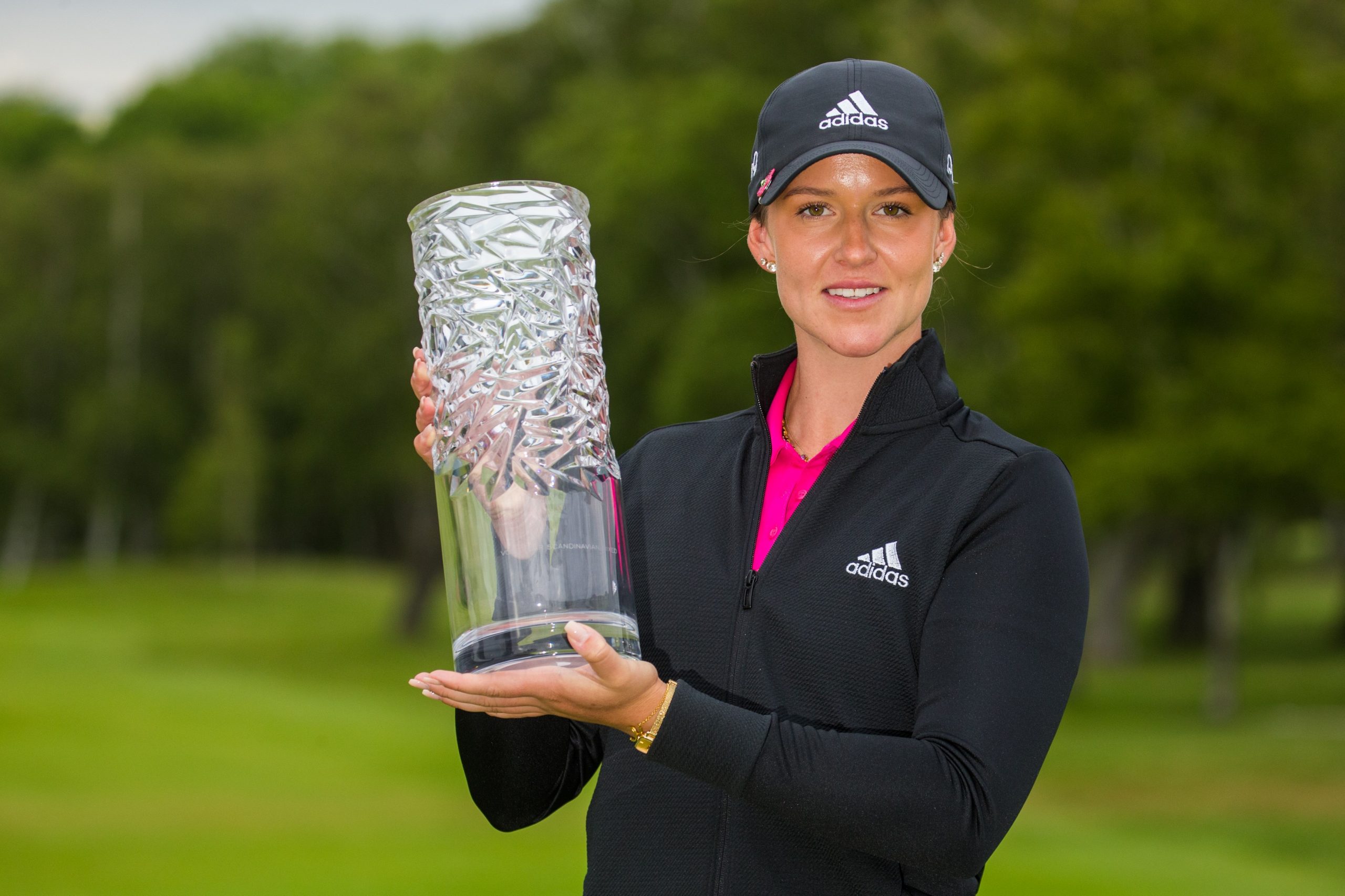 Sweden’s Linn Grant scripts a milestone in golf, beats men to win Mixed event; host Stenson is second.