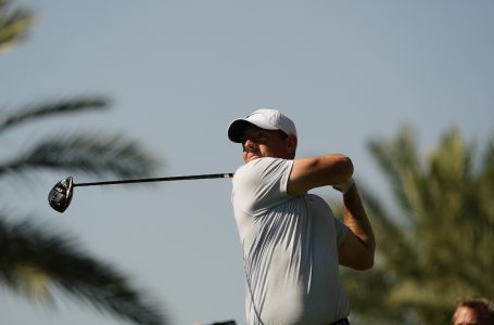 McIlroy takes a double dip in water for a quad but still leads in Dubai